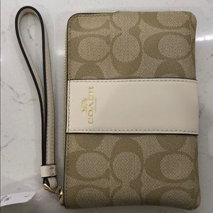 Coach- Gold Wristlet